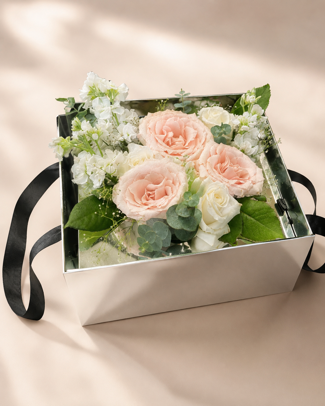 Soft blush and white flower box with roses and seasonal flowers