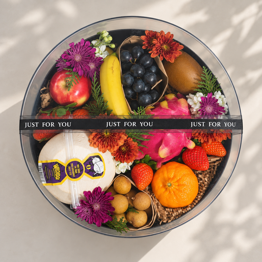 Luxury-style acrylic flower and fruit gift box with premium fresh fruit and seasonal blooms
