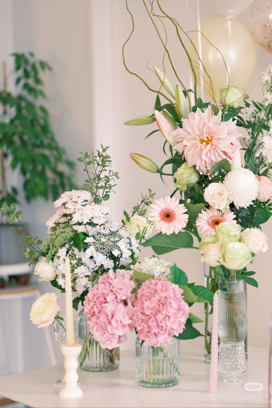 Pastel floral arrangement for a children's birthday celebration by Gooday Floral Auckland